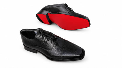A pair of men's black leather lace-up dress shoes shown on a white background, with one shoe displaying its bright red outsole and the other showing the side profile.